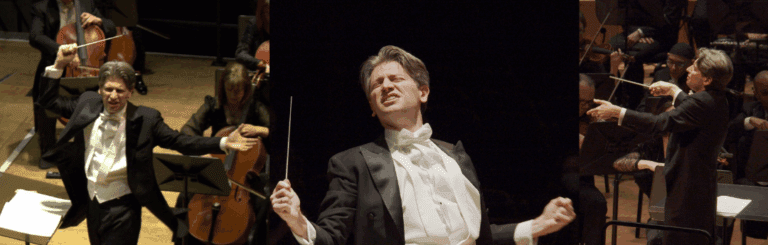 A male conductor in a tuxedo leads the Ulster Orchestra, gesturing energetically with a baton in three different poses on stage, capturing a retrospective of Daniele Rustioni's dynamic conducting style.
