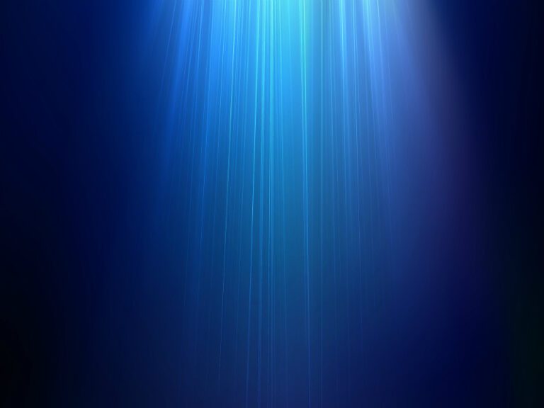 Blue light beams radiate downward against a dark blue gradient background, creating a soft, glowing requiem effect.